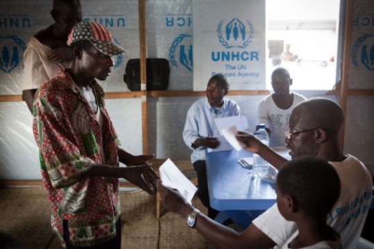 UNHCR staff help prepare Angolan refugees for their return home from the Democratic Republic of the Congo