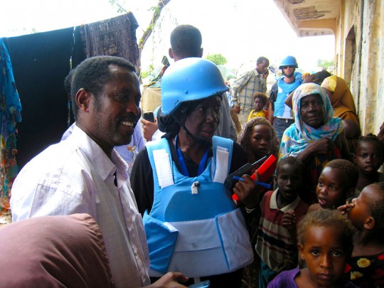 Ahmed Farah Roble and UNHCR staff see first-hand the conditions at IDP settlement in Mogadishu, Somalia.