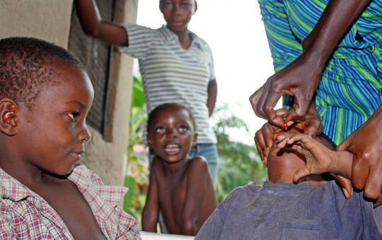 Oral polio vaccine being administered. Photo: UNICEF/Cornelia Walther