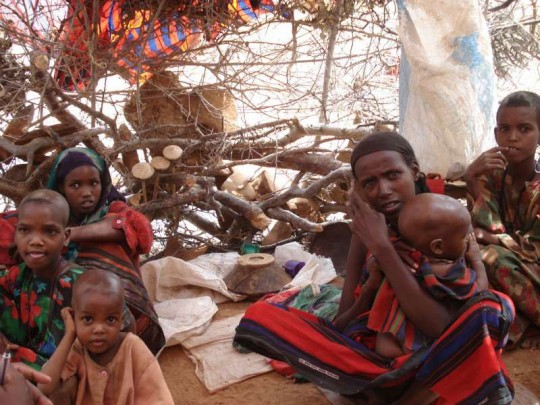 A family of Somali refugees in a makeshift shelter in Kobe camp, Ethiopia