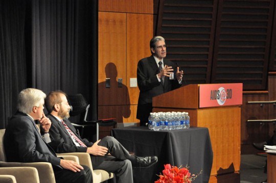Photo by Aubrey LaMedica/ HSPH / A two-day conference titled “AIDS@30: Engaging to End the Epidemic,” which drew hundreds to the Joseph B. Martin Conference Center, worked to engage those who know the ailment best to plot its end. The Dec. 1 discussion brought together Harvard School of Public Health Dean Julio Frenk (right), Harvard Provost Alan Garber (center) and Richard Marlink (left), the program chair and Beal Professor of the Practice of Public Health.