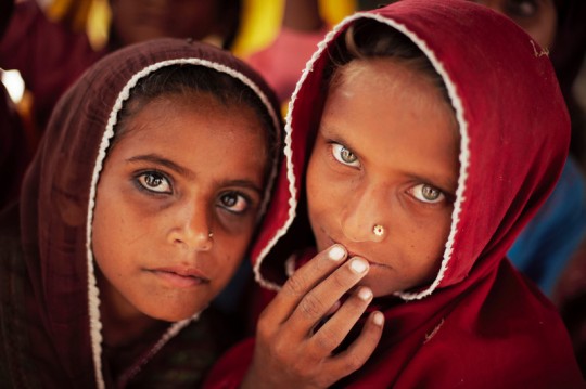 Sisters displaced by the devastating floods in Pakistan’s Sindh Province in 2011. Credit: UNHCR/S. Phelps