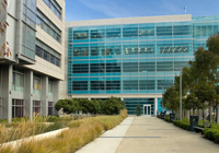 The J. David Gladstone Institutes, center, was the first to move near UCSF Mission Bay.