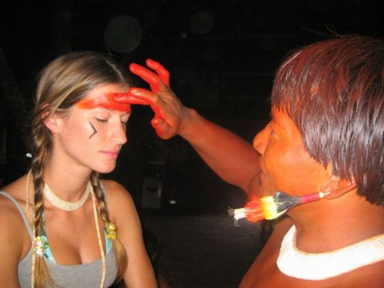 Gisele was extremely moved and inspired to environmental action by a visit to an Indian tribe on the Xingu River in the Amazon Rainforest./Photo Credit: Personal Archive