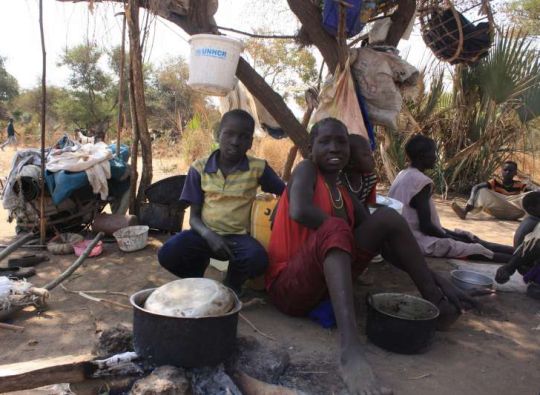 Relieved Sudanese youngsters rest after arriving at Doro refugee camp in South Sudan. High Commissioner António Guterres called on the international community to do more to support the relief effort and avert a massive crisis.