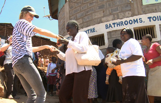 Gisele during a visit to an Energy Project in Kibera, Nairobi, Kenya.