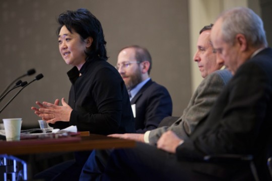 Harvard Initiative for Learning and Teaching/ “You should never underestimate the power of trying to do big, collective things as an organization,” said Youngme Moon (second from left), senior associate dean at Harvard Business School. Moon was joined in an afternoon panel by Harvard Provost Alan Garber (far left), Harvard Corporation member Lawrence S. Bacow, and Michael Sandel, the Anne T. and Robert M. Bass Professor of Government. /Photo by Stephanie Mitchell/Harvard Staff Photographer
