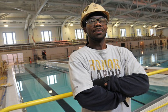 Building Futures, Building Buildings Marc Nixon earned his GED and a place in Laborers Local 271 through the Building Futures program. He’s been working on construction downtown and at Brown, including the new aquatics and fitness center.	 Credit: Frank Mullin/Brown University