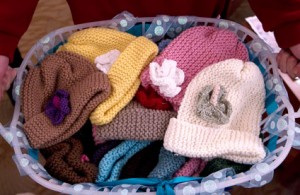 Andrea Fisher's family and friends worked for almost two years to knit 50 caps for patients at Stanford Cancer Center.