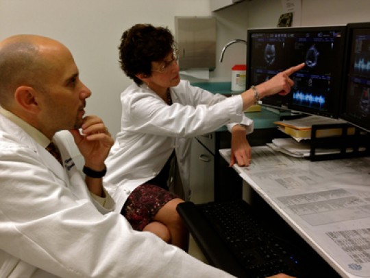 UCSF specialists Ian Harris, MD, left, and Elyse Foster, MD, consult on a case at the UCSF Cardiovascular Care & Prevention Center at Mission Bay.