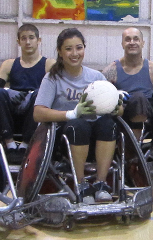 Angelica Galang, left, and her teammates with the United States Quad Rugby Association