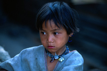 Child in a poor village in Thailand, where artemisinin-resistant malaria has begun to emerge. Photo by N. Durrell McKenna, Wellcome Images. All rights reserved by Wellcome Images.