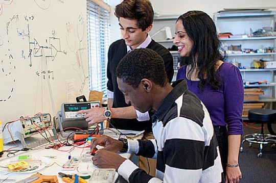 Eliza Grinnell/ SEAS/ Students in the undergraduate teaching labs at SEAS are investigating plant-based materials that may help regrow damaged neurons. The team includes (from front to back) Godwin Abiola '14, Undergraduate Studies in Biomedical Engineering Assistant Director Sujata Bhatia, and Erfan Soliman '12.