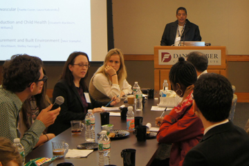 Williams moderating a discussion at the Harvard Catalyst Health Disparities Research Program. Image: Anna Schachter