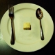 Smaller plates may not be helpful tools for dieters, study suggests.